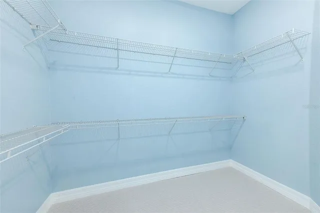a view of a room with racks on the wall