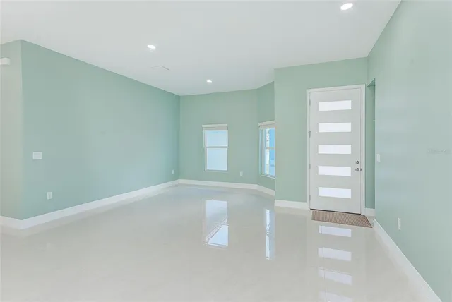 an empty room with windows