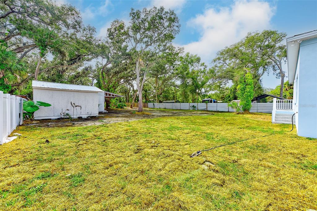 11111 Hackney Drive Riverview, FL 33578 - Photo 30 of 40 a view of a swimming pool with an outdoor space and seating area