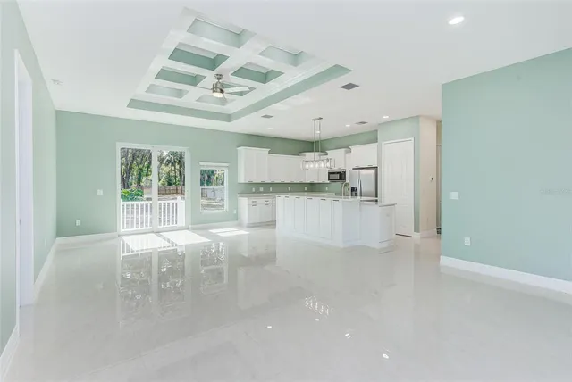 a view of a kitchen and window