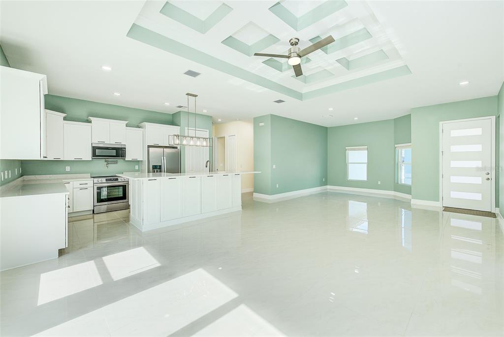 11111 Hackney Drive Riverview, FL 33578 - Photo 7 of 40 a view of a kitchen with kitchen island a sink stainless steel appliances and cabinets