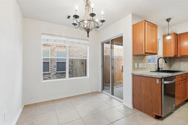 a view of a granite countertop cabinets