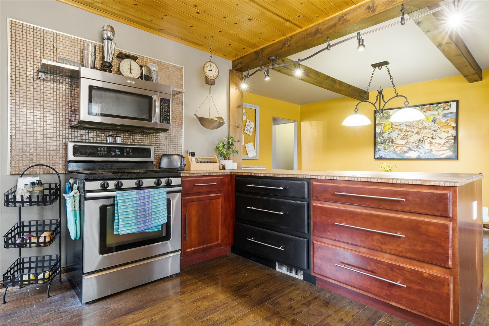 1103 Morgan Street Normal, IL 61761 - Photo 11 of 35 a kitchen with a stove and a microwave