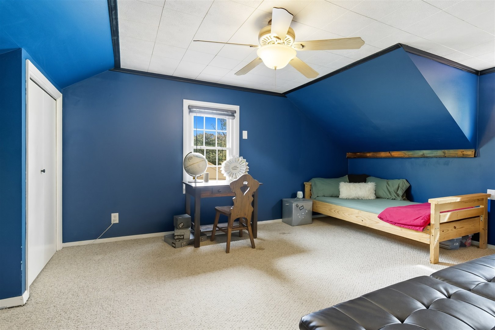 1103 Morgan Street Normal, IL 61761 - Photo 20 of 35 a room with furniture and a chandelier