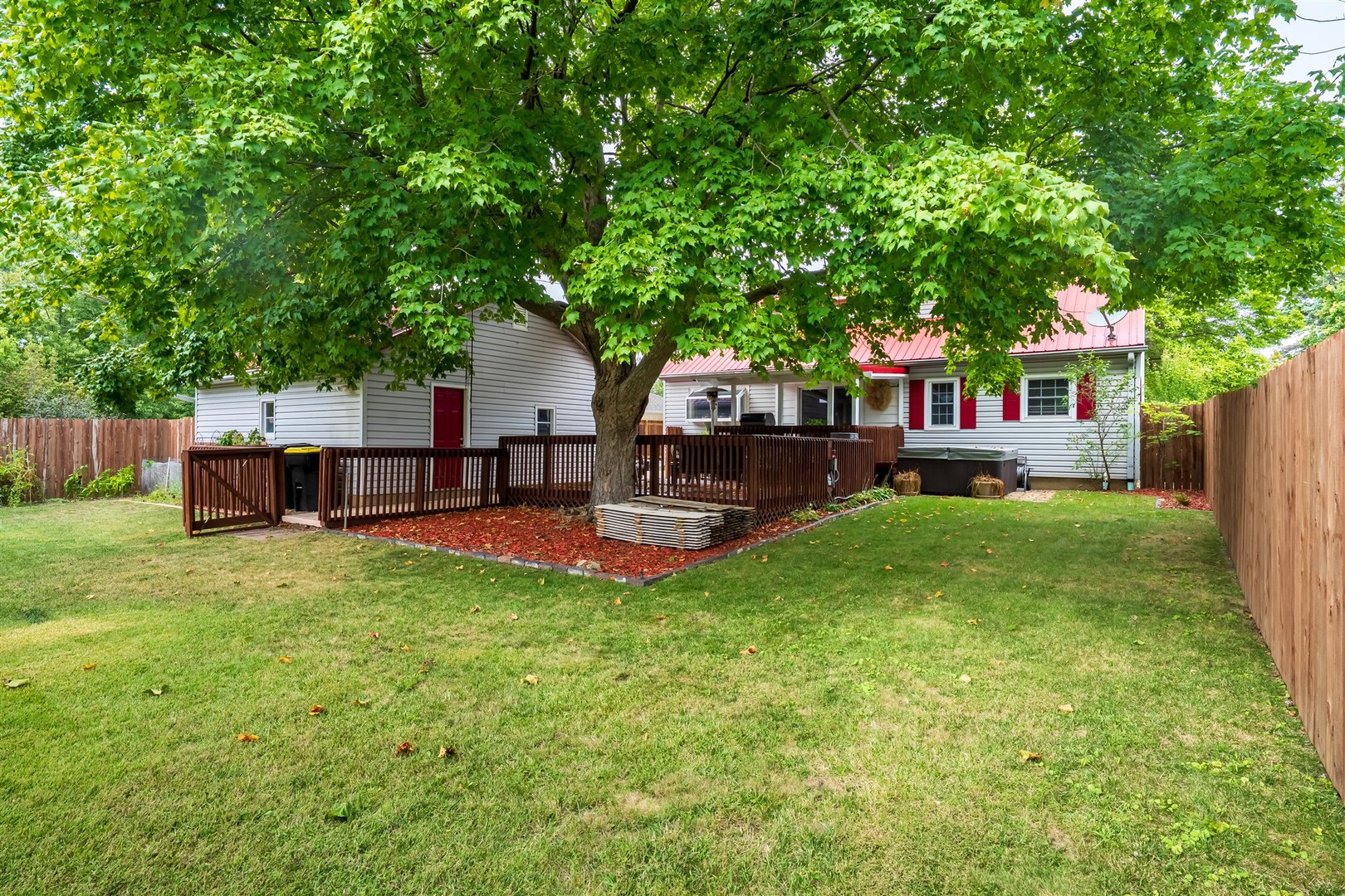 1103 Morgan Street Normal, IL 61761 - Photo 28 of 35 a view of house with backyard and a garden