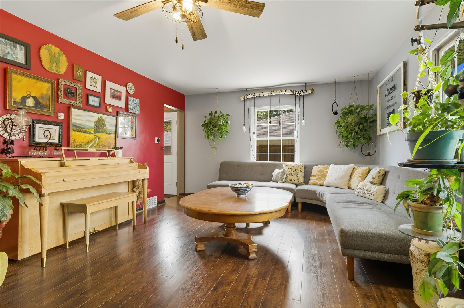 1103 Morgan Street Normal, IL 61761 - Photo 3 of 35 a living room with fireplace furniture and a wooden floor