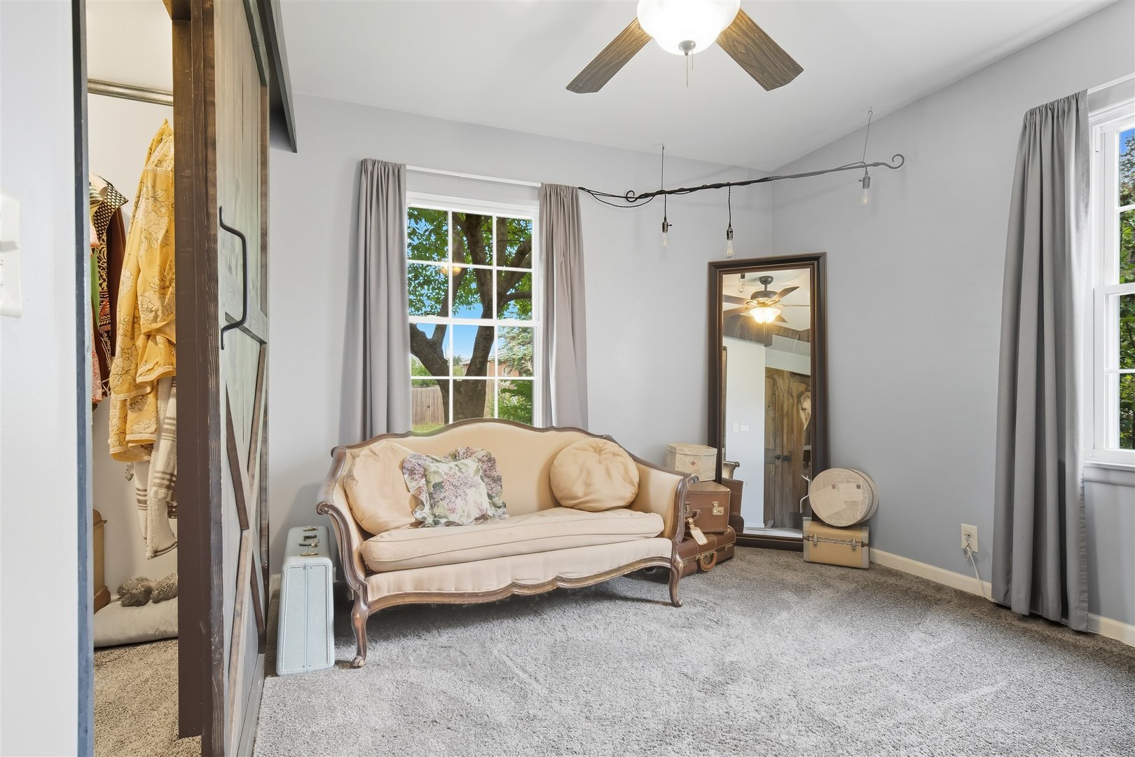 1103 Morgan Street Normal, IL 61761 - Photo 6 of 35 a bedroom with a bed and a large window with wooden floor