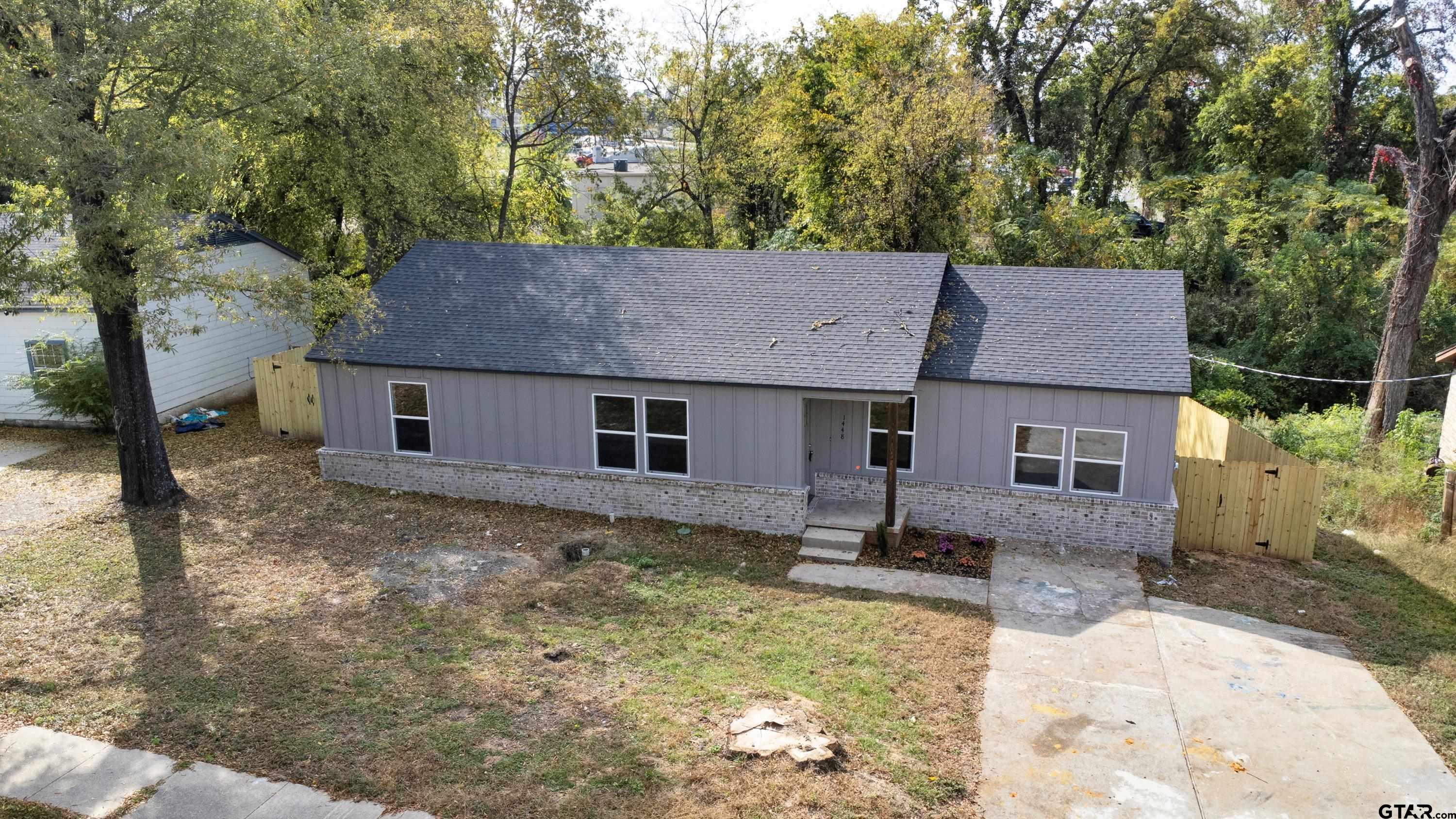 a view of house with outdoor space