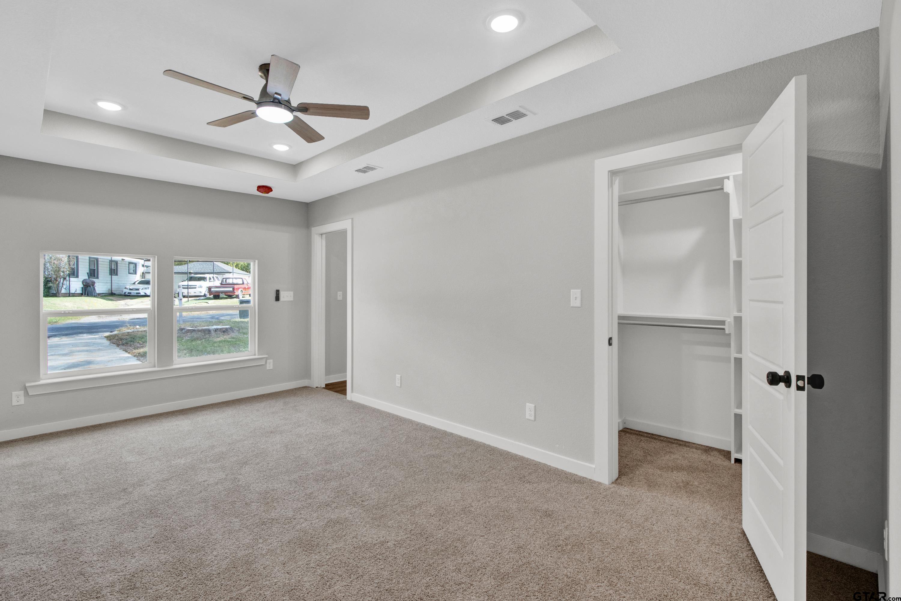 1448 Crescent Drive Tyler, TX 75702 - Photo 20 of 32 a view of an empty room with a window