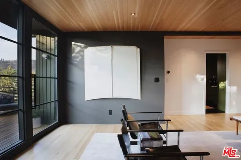 a living room with a couch and a table