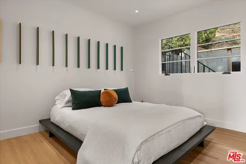 a view of a chair and table in the patio