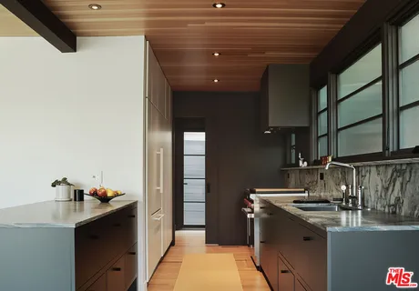 a workspace with furniture window and outside view