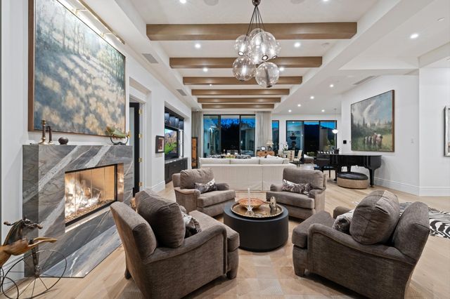 a sitting area with large window