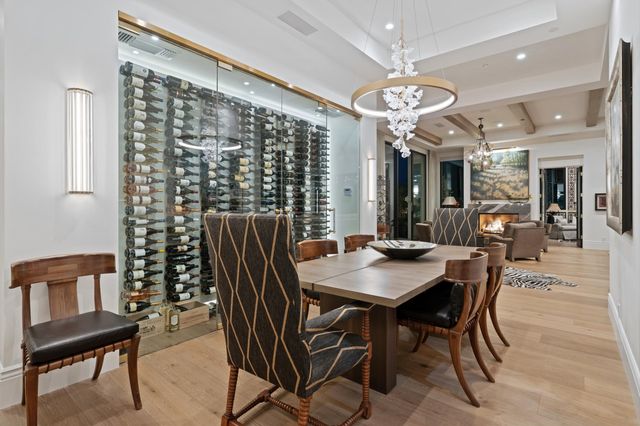 a kitchen with stainless steel appliances a refrigerator and a stove