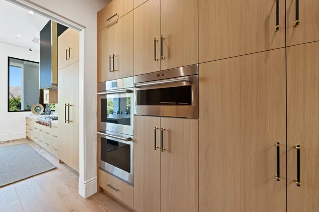 a bathroom with a shower and a mirror