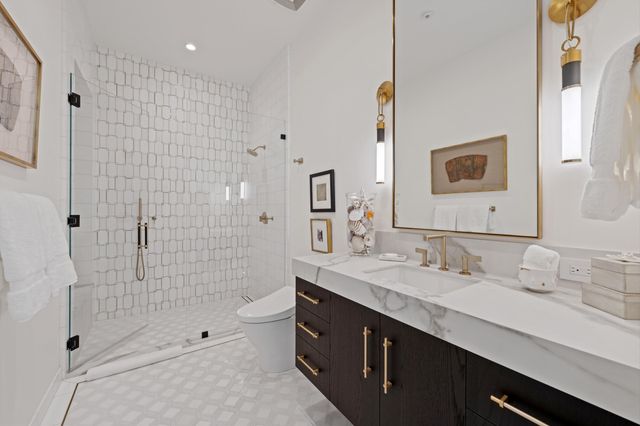 an aerial view of residential houses and street