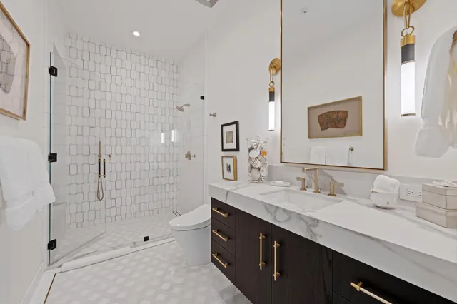 an aerial view of residential houses and street