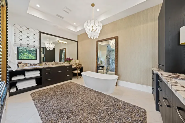 a view of a backyard with plants and a garden