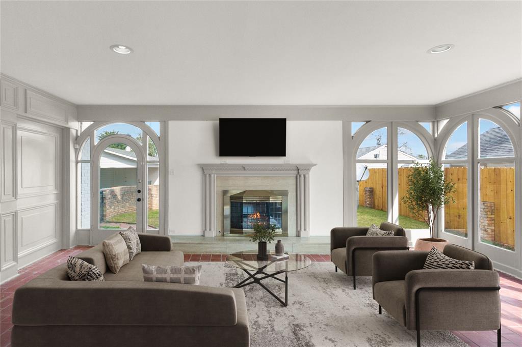 401 West 4th Street Tyler, TX 75701 - Photo 15 of 34 a living room with furniture fireplace and a large window