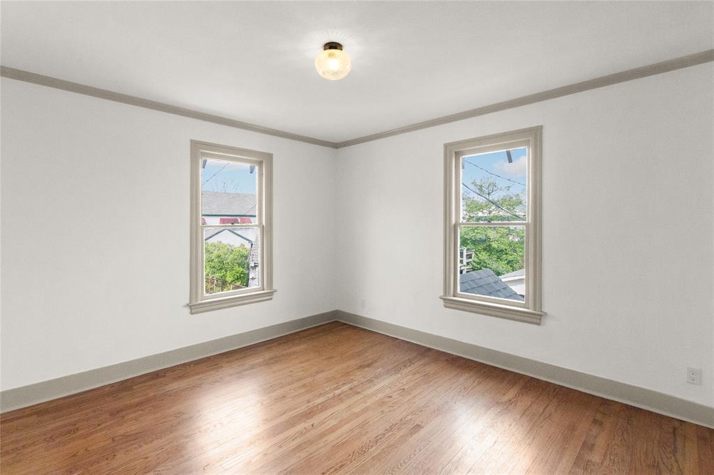 401 West 4th Street Tyler, TX 75701 - Photo 22 of 34 an empty room with windows
