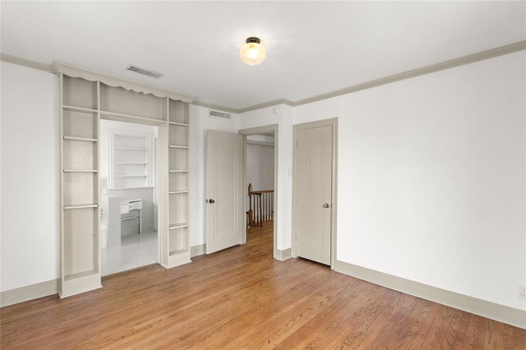 401 West 4th Street Tyler, TX 75701 - Photo 23 of 34 a view of an empty room with wooden floor and a window
