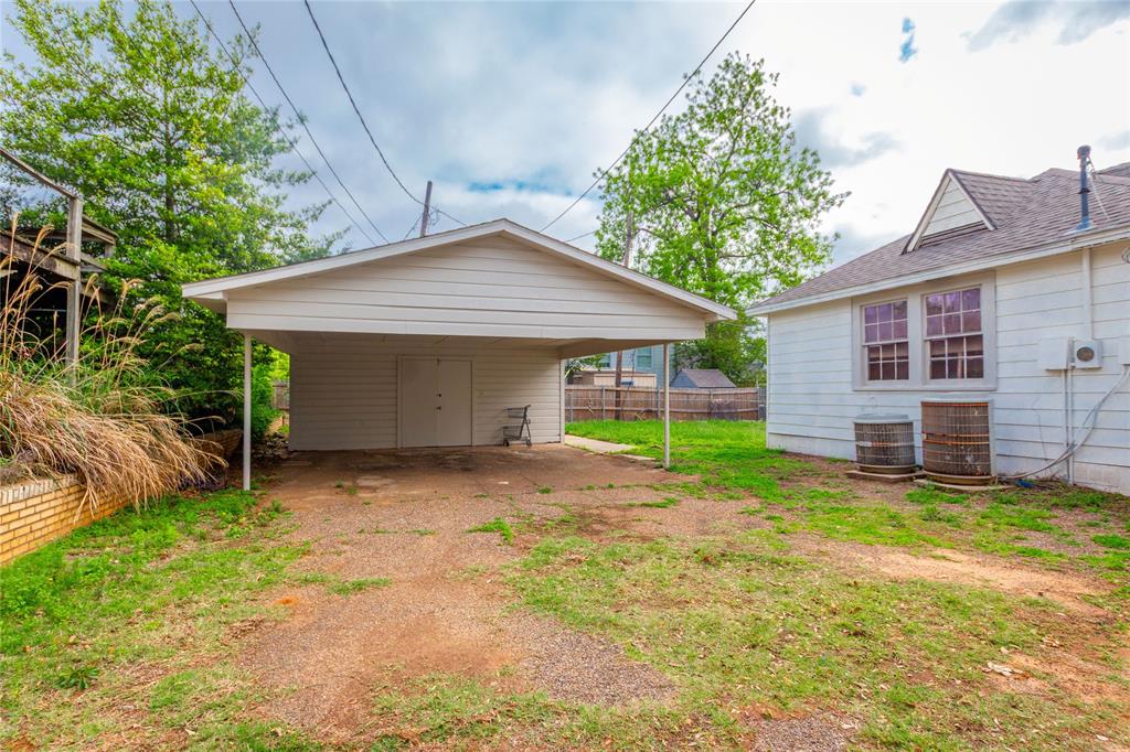 401 West 4th Street Tyler, TX 75701 - Photo 34 of 34 a view of a house with a yard and porch