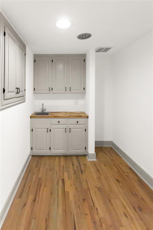 401 West 4th Street Tyler, TX 75701 - Photo 6 of 34 a view of kitchen with wooden floor