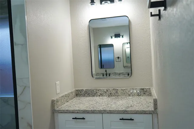 a view of a backyard with plants