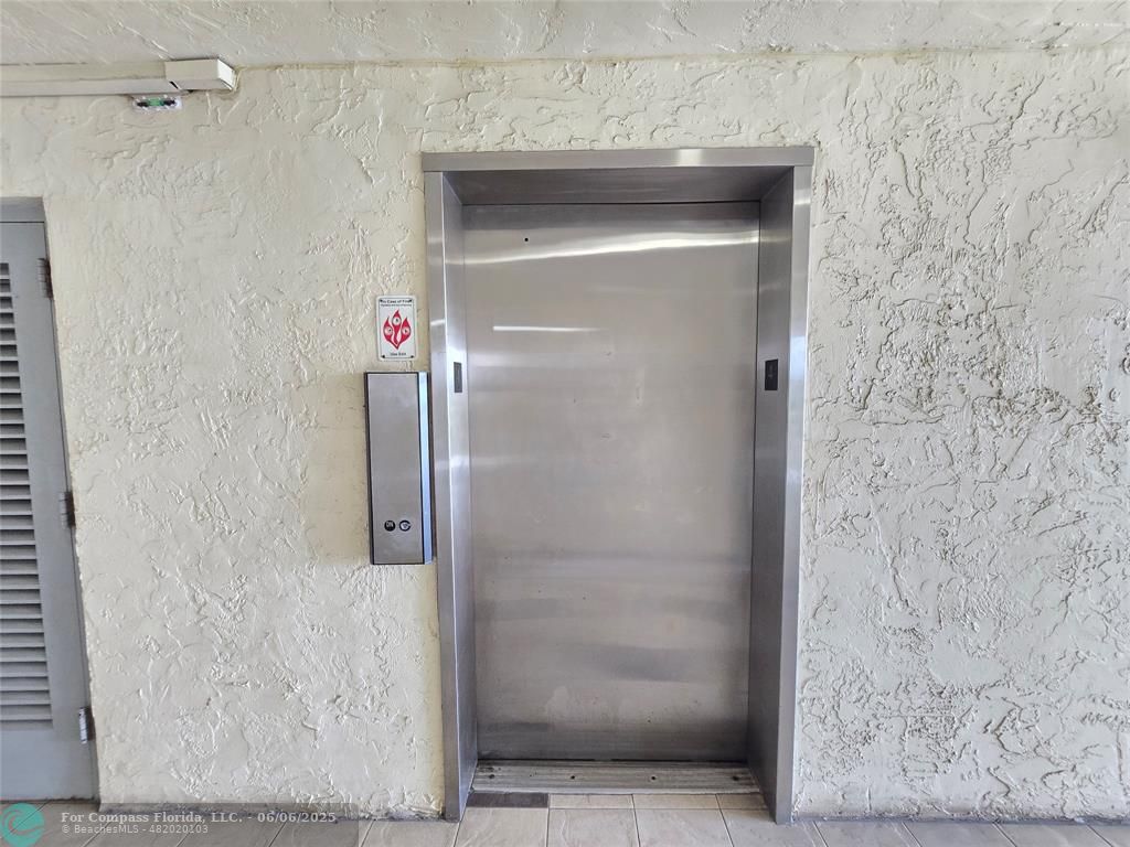 3000 Northwest 48th Terrace, Unit 430 Lauderdale Lakes, FL 33313 - Photo 15 of 15 a bathroom with a shower