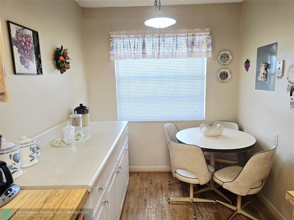 3000 Northwest 48th Terrace, Unit 430 Lauderdale Lakes, FL 33313 - Photo 5 of 15 a bathroom with a sink and a mirror