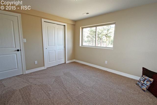 11420 Teachout Road Colorado Springs, CO 80908 - Photo 31 of 36 Bedroom number four in the basement.