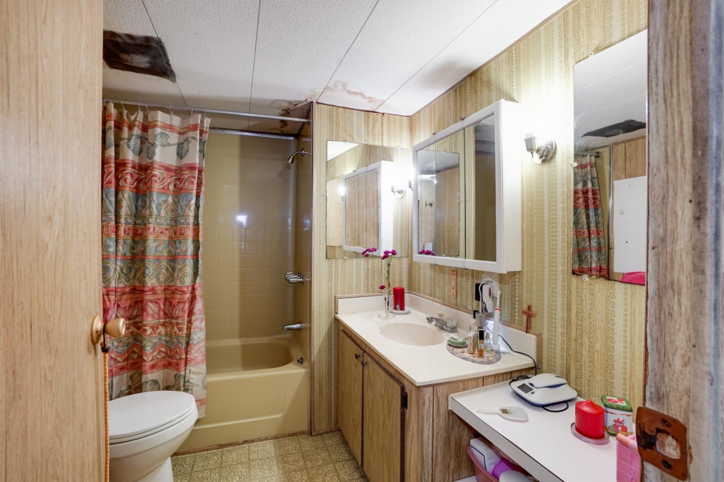 2 Sea Shell Circle, Unit 2 Half Moon Bay, CA 94019 - Photo 12 of 28 a bathroom with a sink toilet double vanity and shower