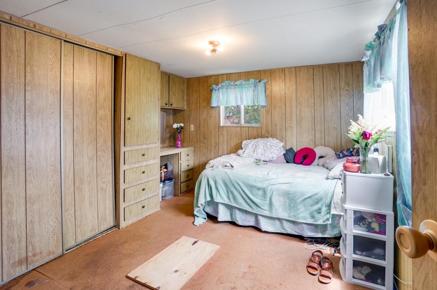 2 Sea Shell Circle, Unit 2 Half Moon Bay, CA 94019 - Photo 13 of 28 a bedroom with a bed and a window