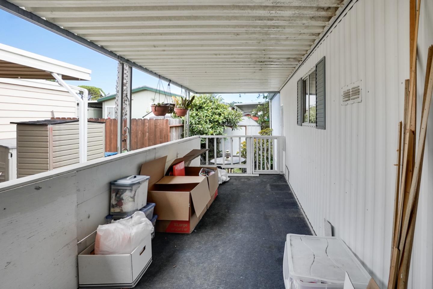 2 Sea Shell Circle, Unit 2 Half Moon Bay, CA 94019 - Photo 15 of 28 a living room with furniture and a large window