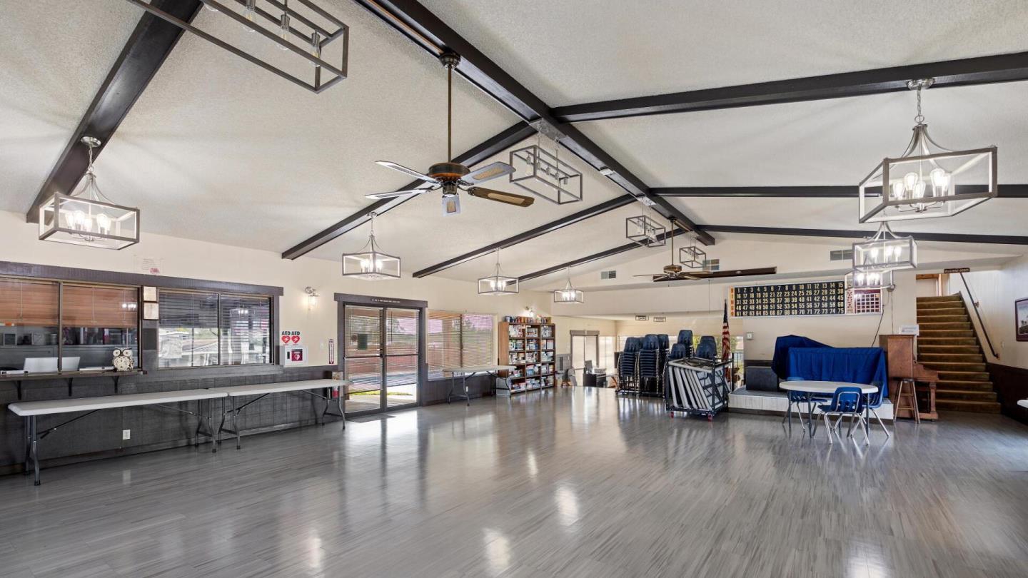 2 Sea Shell Circle, Unit 2 Half Moon Bay, CA 94019 - Photo 23 of 28 a living room with lots of furniture and wooden floors