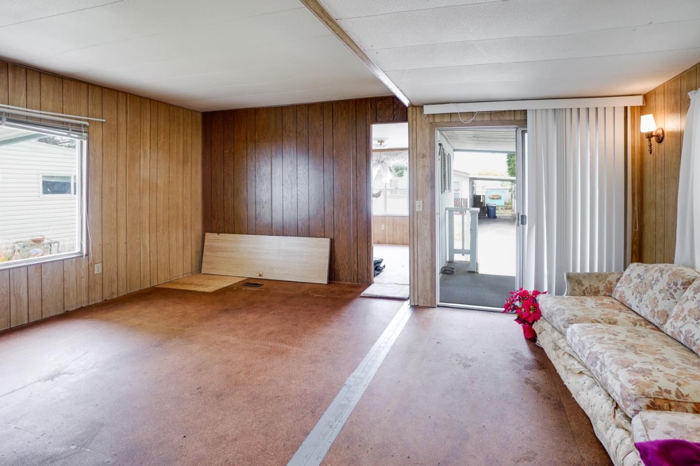 2 Sea Shell Circle, Unit 2 Half Moon Bay, CA 94019 - Photo 6 of 28 a view of livingroom with hardwood floor and cabinet