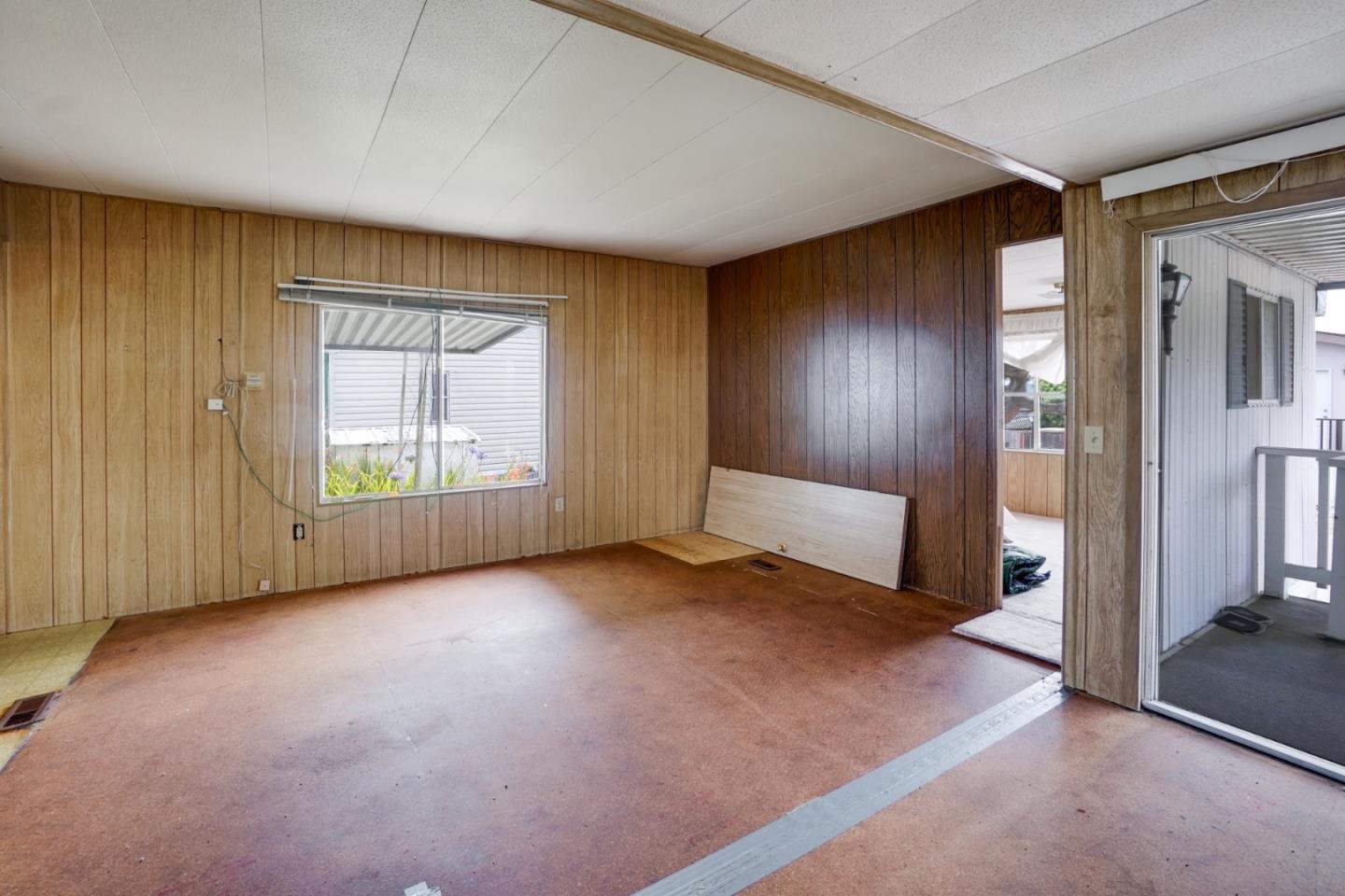 2 Sea Shell Circle, Unit 2 Half Moon Bay, CA 94019 - Photo 7 of 28 an empty room with windows
