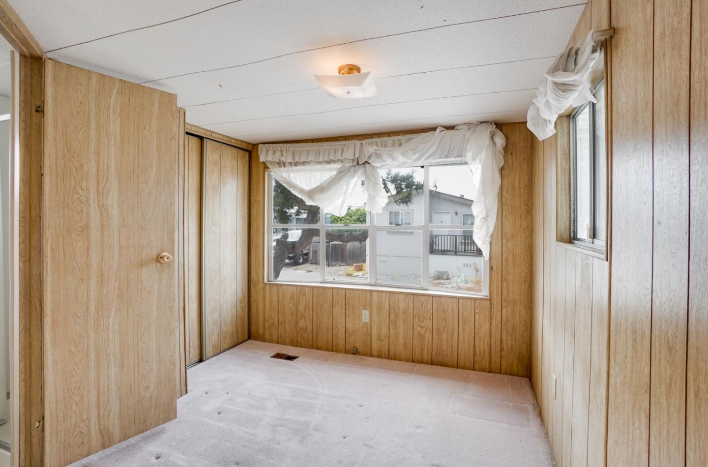 2 Sea Shell Circle, Unit 2 Half Moon Bay, CA 94019 - Photo 9 of 28 a view of an empty room with a window