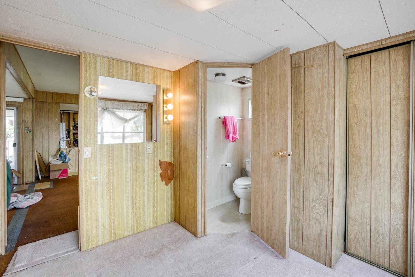 2 Sea Shell Circle, Unit 2 Half Moon Bay, CA 94019 - Photo 10 of 28 a bathroom with a toilet and a shower