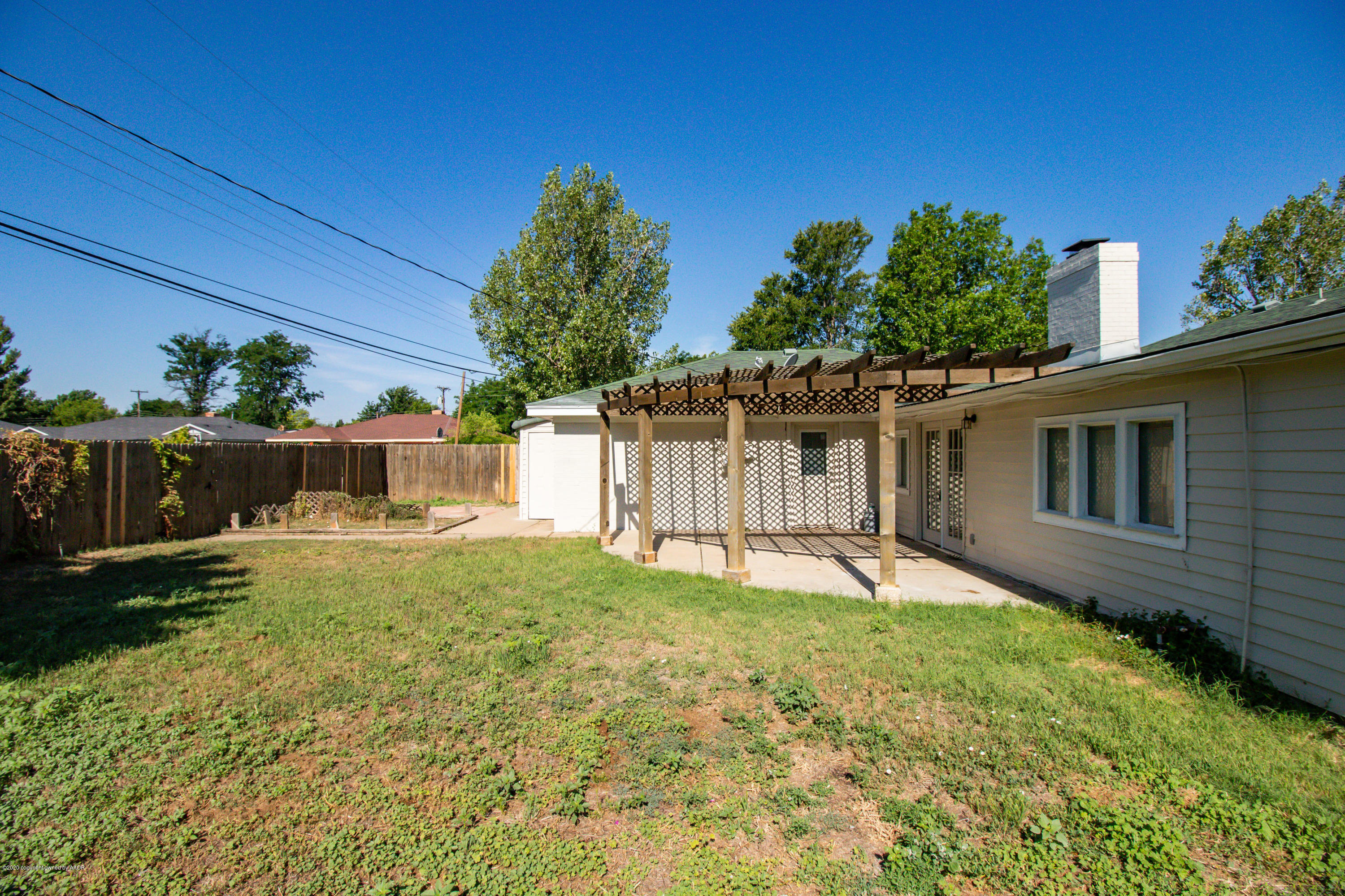 6605 Dreyfuss Road Amarillo, TX 79106 - Photo 34 of 39 a house view with a garden space
