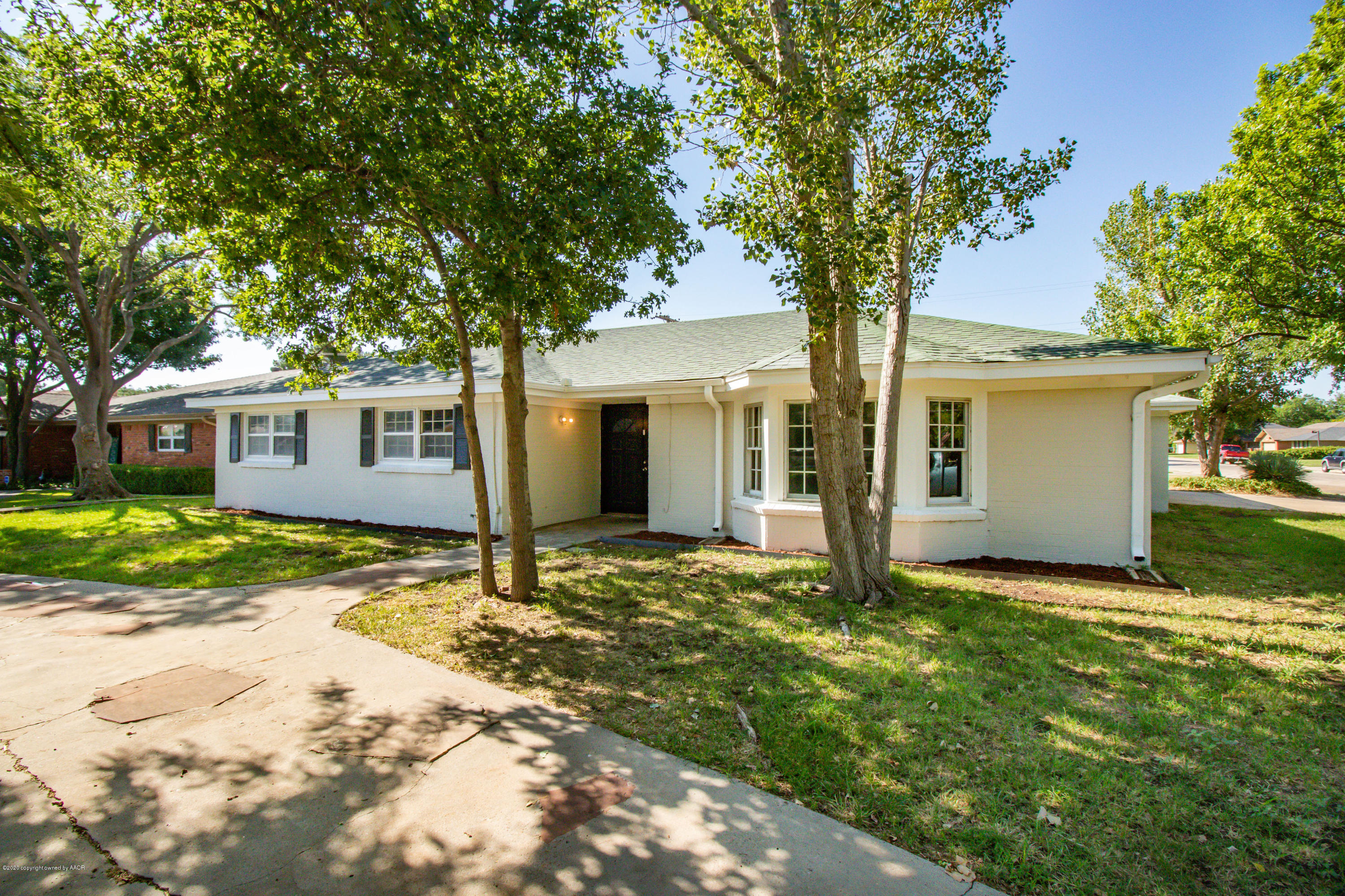 6605 Dreyfuss Road Amarillo, TX 79106 - Photo 36 of 39 a house with yard in front of it