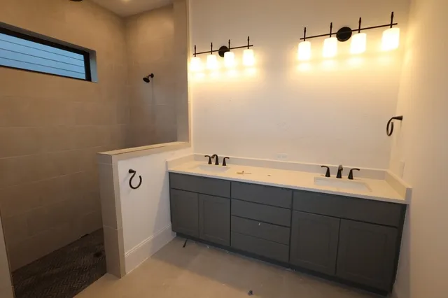 a view of house with outdoor space and parking