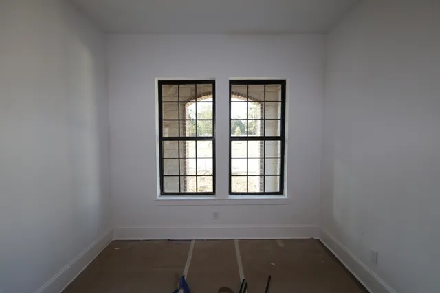 a kitchen with kitchen island a sink and a stove