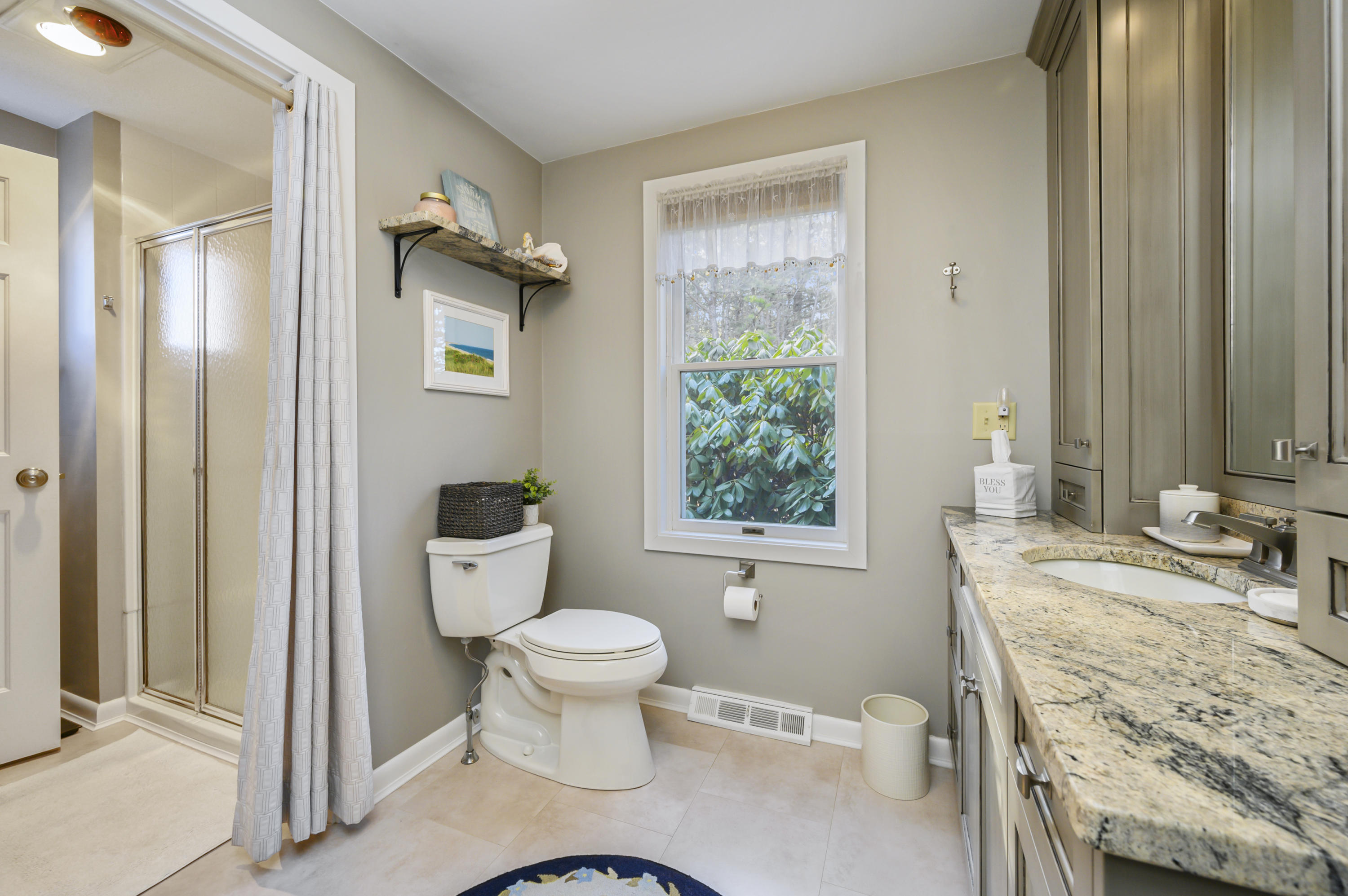 Undisclosed Address Mashpee, MA 02649 - Photo 19 of 21 a bathroom with a sink toilet and shower