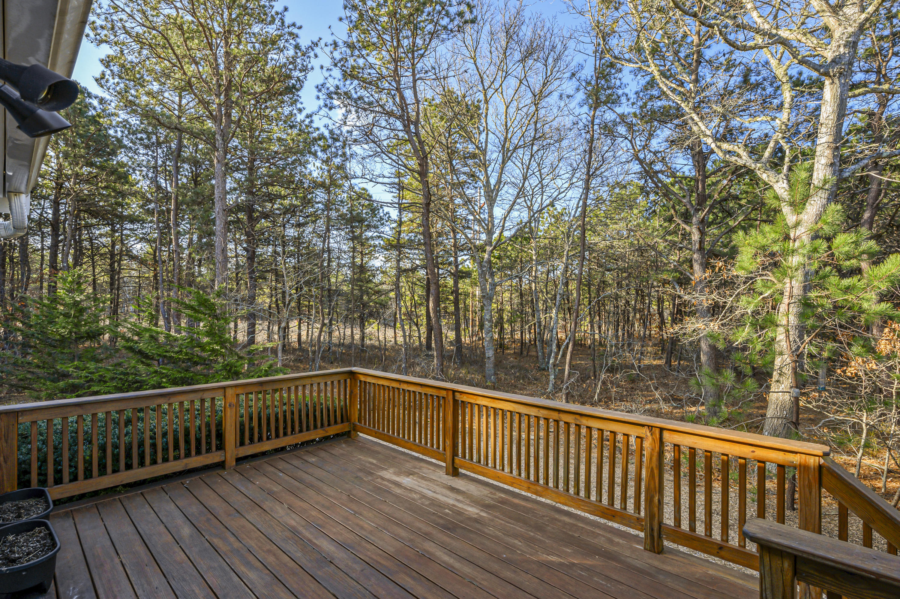 Undisclosed Address Mashpee, MA 02649 - Photo 20 of 21 a view of balcony with wooden floor