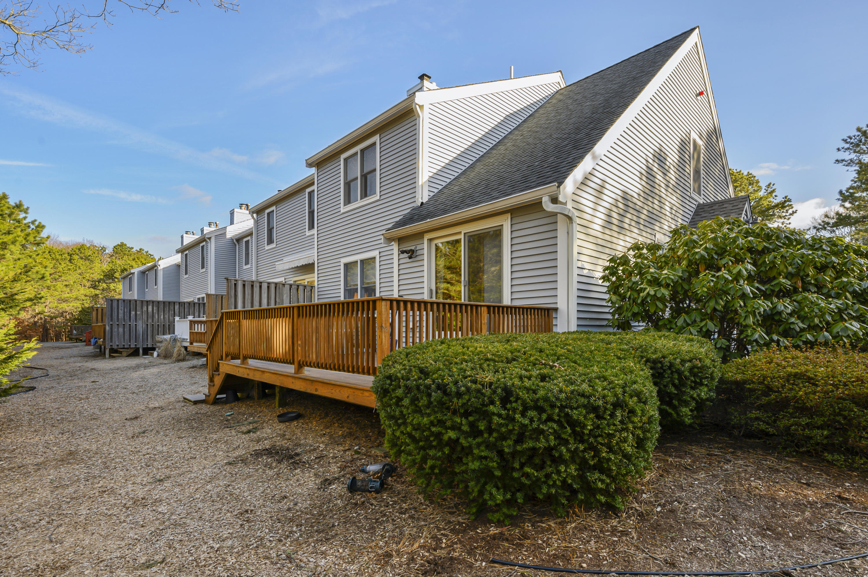 Undisclosed Address Mashpee, MA 02649 - Photo 21 of 21 a view of a house with a yard