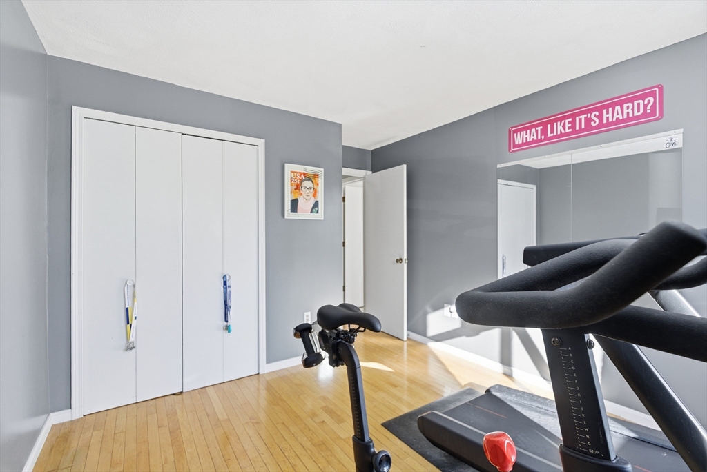 4 Erick Road, Unit 90 Mansfield, MA 02048 - Photo 22 of 30 a view of a livingroom with furniture and a table