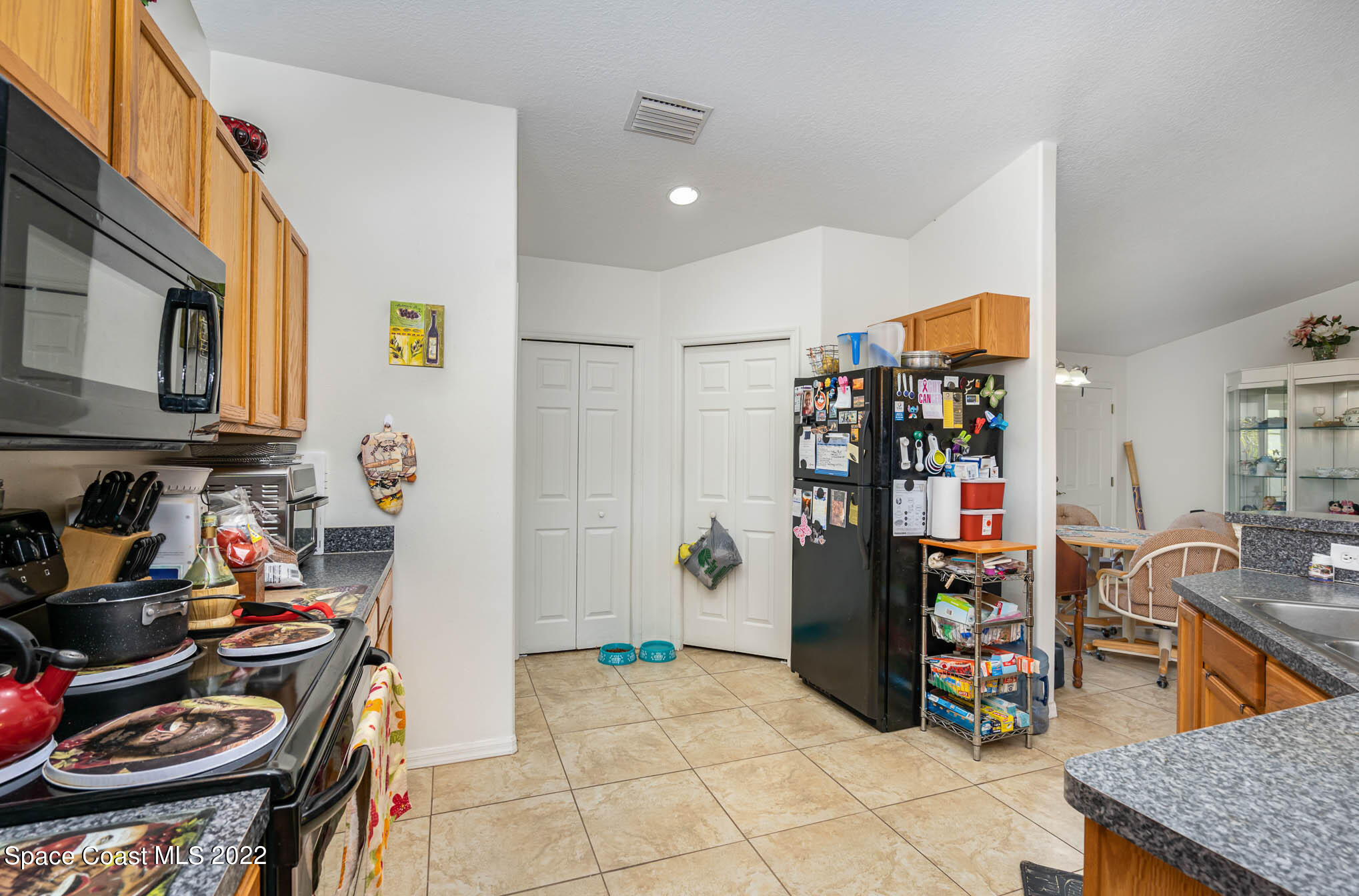 1247 Van Tassel Trail Palm Bay, FL 32905 - Photo 7 of 31 a view of a storage & utility room