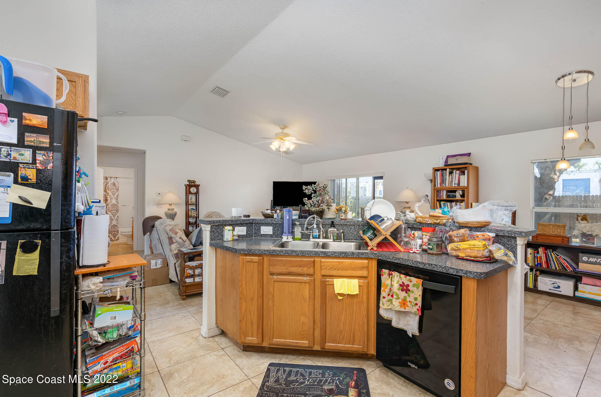 1247 Van Tassel Trail Palm Bay, FL 32905 - Photo 8 of 31 a view of a play room with furniture and toys