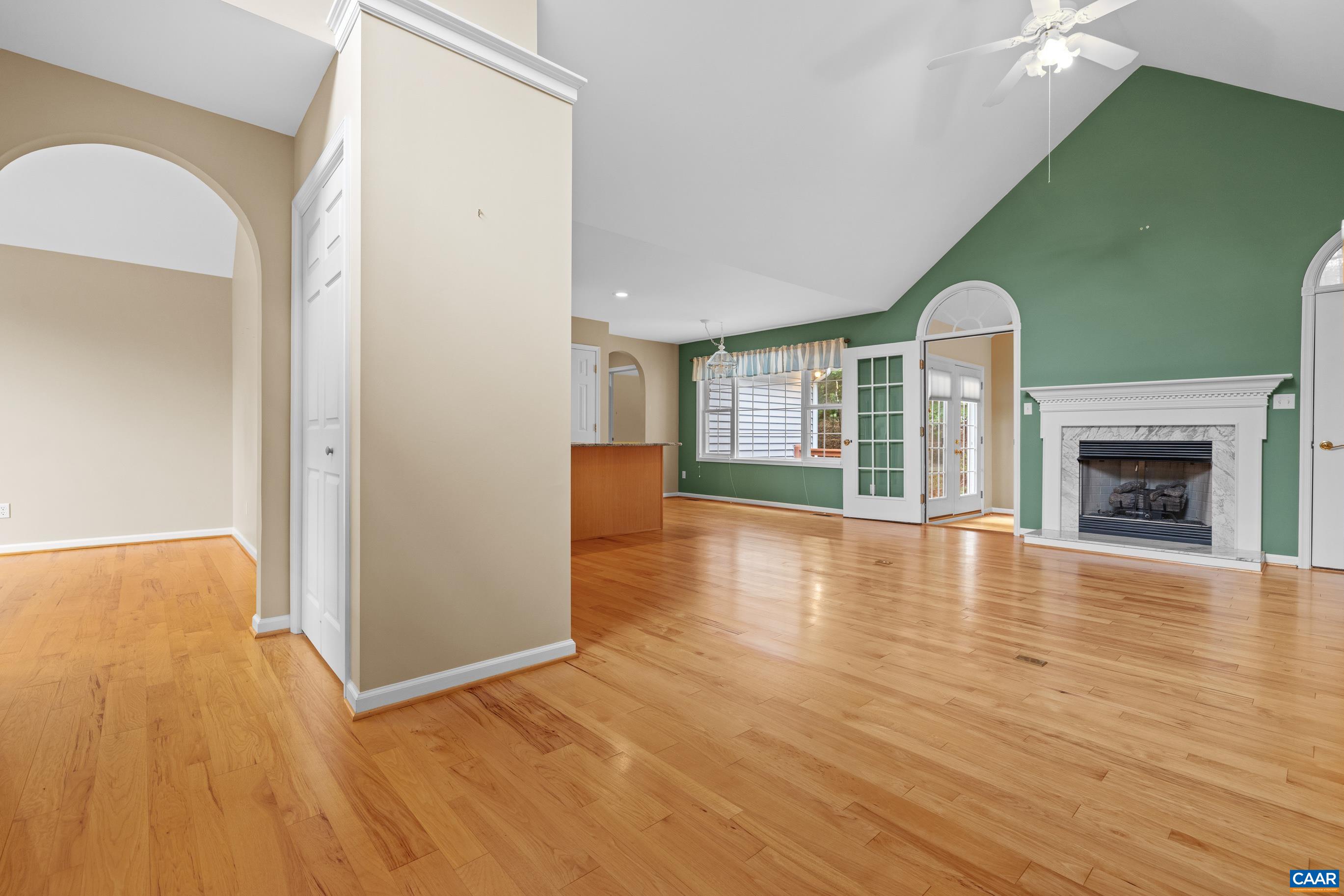 34 Zephyr Road Palmyra, VA 22963 - Photo 14 of 38 an empty room with wooden floor and fireplace